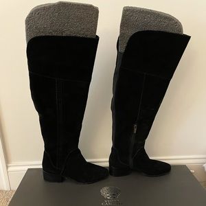 Above the knee black boots